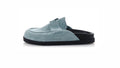 Hermès Go mules made of light blue suede calfskin.